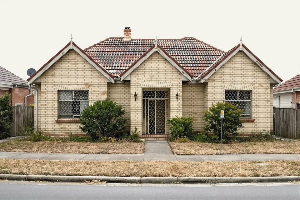 Triple-fronted to pavilion home, before